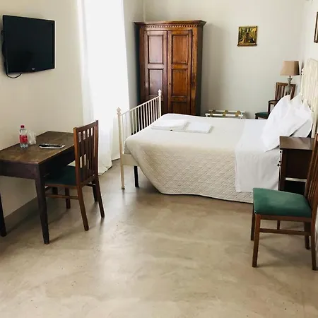 Отель Relais Real Collegio Ноли