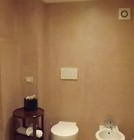 Отель Relais Real Collegio